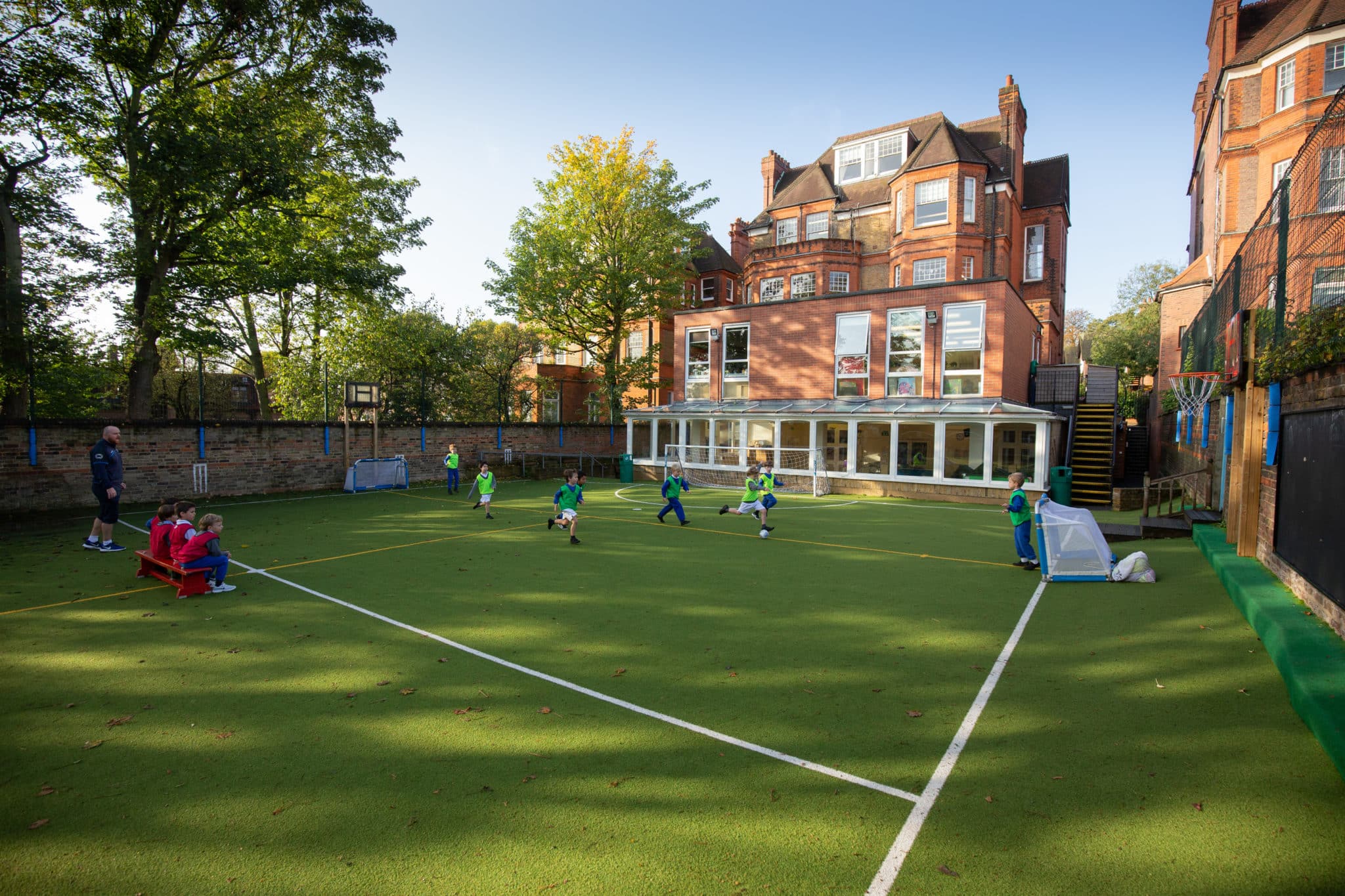 Children playing football outside of Darul Hadis